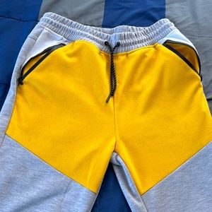 Yellow grey white and black joggers
